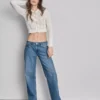 Avslappnade jeans med låg midja och raka ben