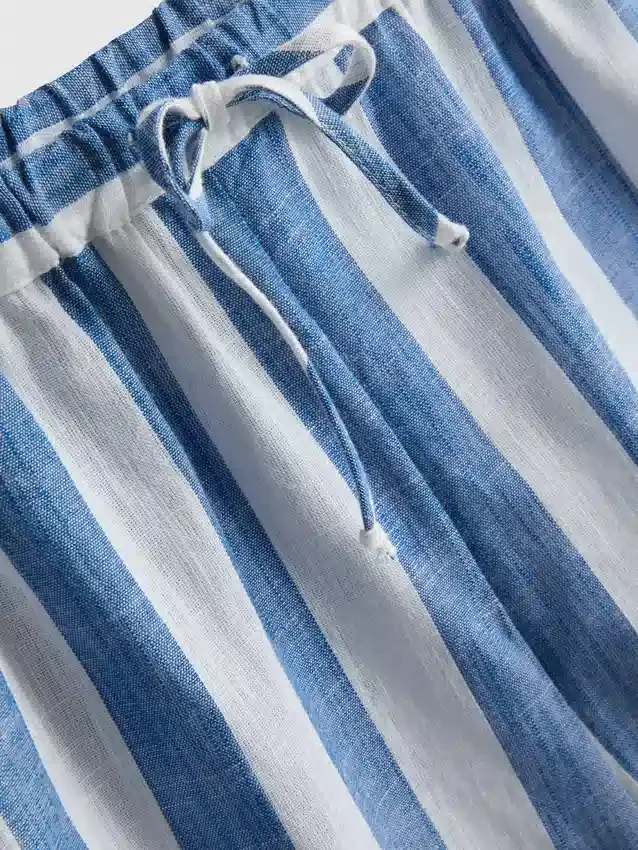 Avslappnade randiga strandshorts i bomull