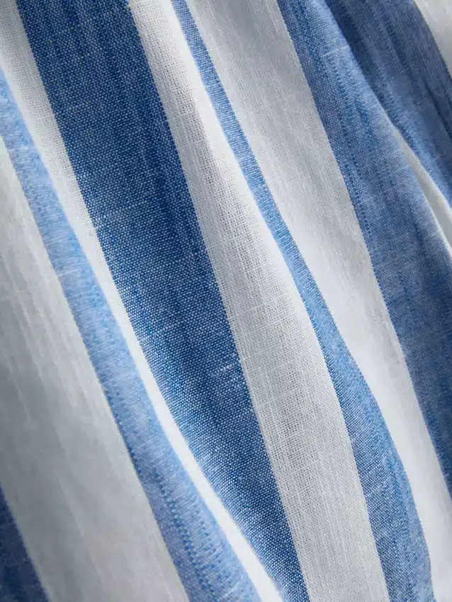 Avslappnade randiga strandshorts i bomull