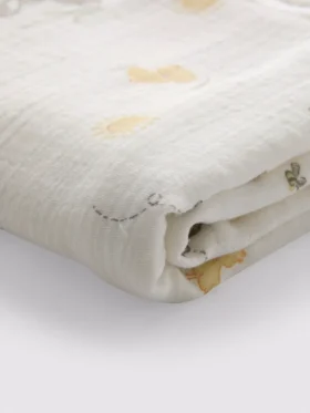 Babytäcke i muslin med djurmotiv