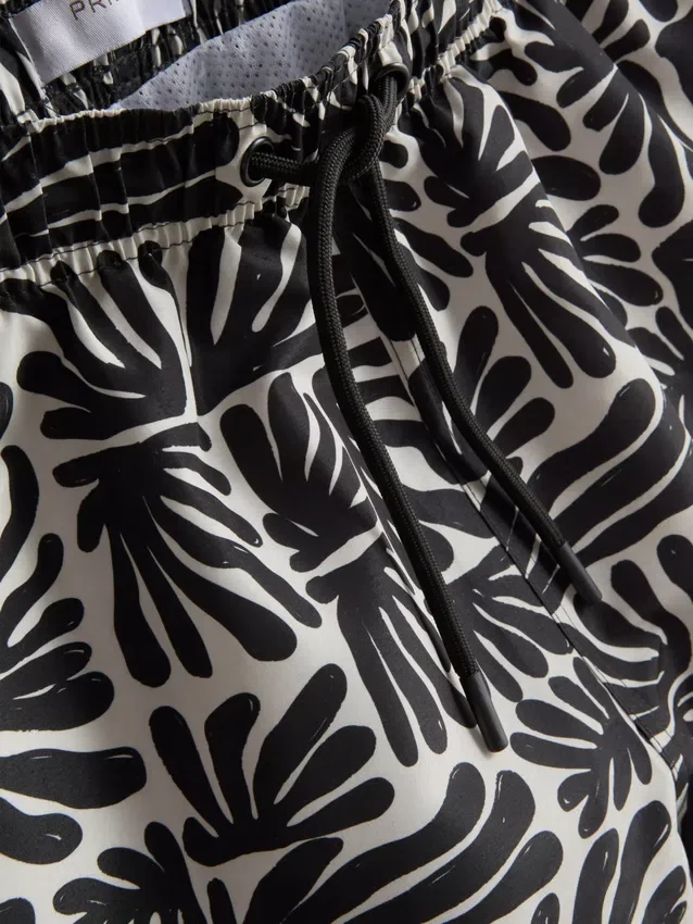 Badshorts med abstrakt tryck