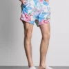 Badshorts med blommigt graffitimönster