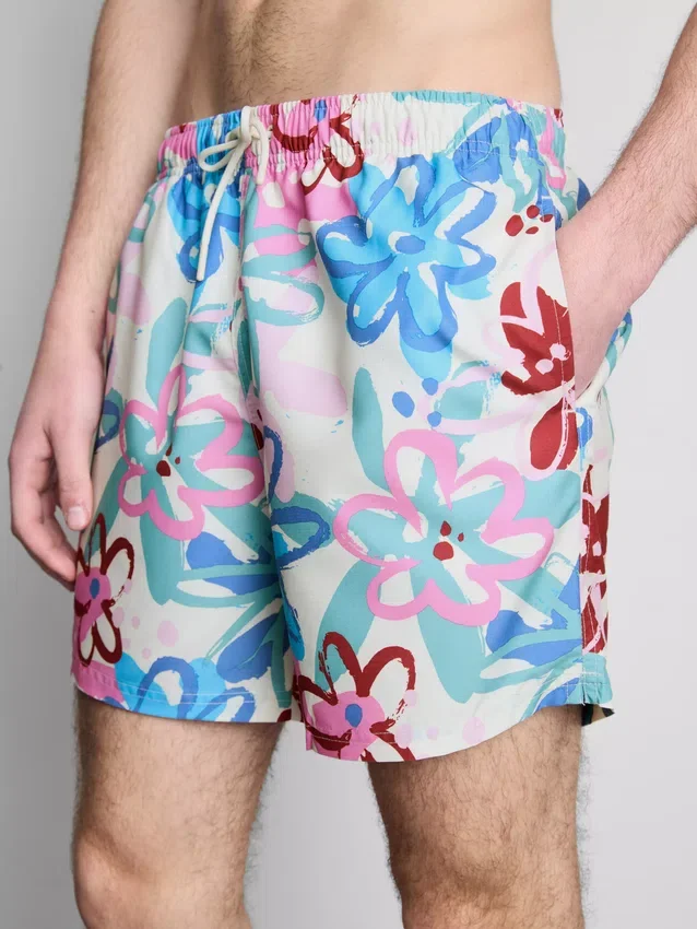 Badshorts med blommigt graffitimönster
