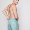 Badshorts med broderade löv
