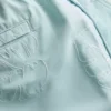 Badshorts med broderade löv