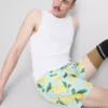 Badshorts med citronmönster