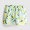 Badshorts med citronmönster