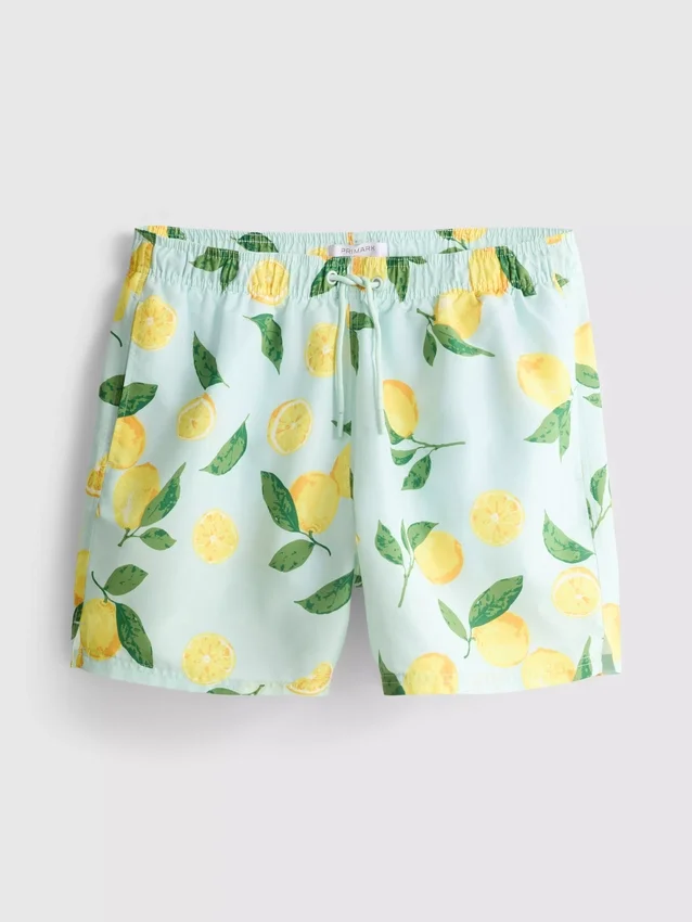 Badshorts med citronmönster
