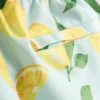 Badshorts med citronmönster
