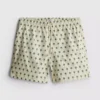 Badshorts med palmträdsmönster