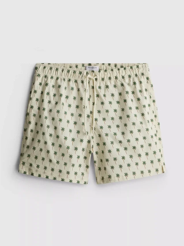 Badshorts med palmträdsmönster