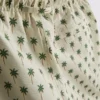 Badshorts med palmträdsmönster