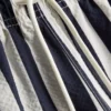 Badshorts med randigt mönster i solstolsstil