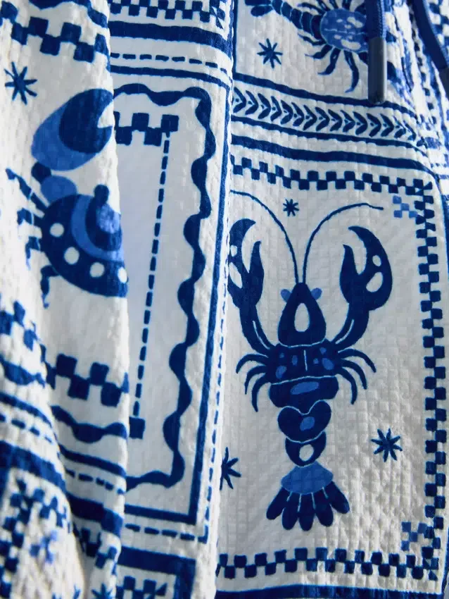 Badshorts med textur som liknar medelhavskakel