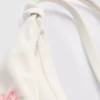 Bikinibottnar med broderat yttertyg och knytband i sidan