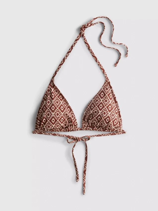 Bikinisett med triangulära överdelar och knytband i sidorna