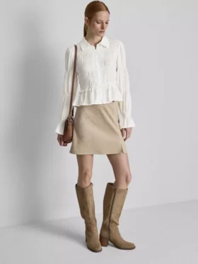 Blus med rynkad peplum-nedkant