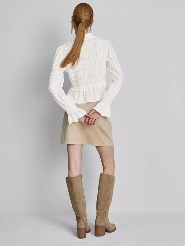 Blus med rynkad peplum-nedkant