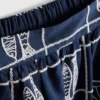 Broderad midikjol i A-linjeform av bomull