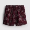 Broderade badshorts med palmträd