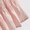 Cami-top med rynkad peplum-kant