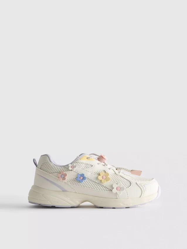 Chunky sneakers med blommiga detaljer