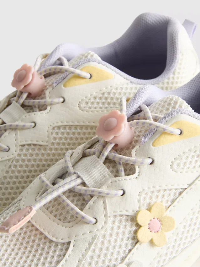 Chunky sneakers med blommiga detaljer