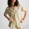 Disneys Nalle Puh-pyjamasar med korta shorts i boyfriend-stil