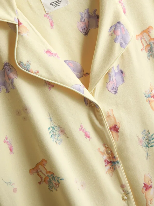 Disneys Nalle Puh-pyjamasar med korta shorts i boyfriend-stil