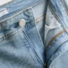 Flared-jeans i bomullsdenim med medelhög midja