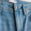 Flared-jeans i bomullsdenim med medelhög midja