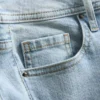 Flared-jeans i bomullsdenim med medelhög midja