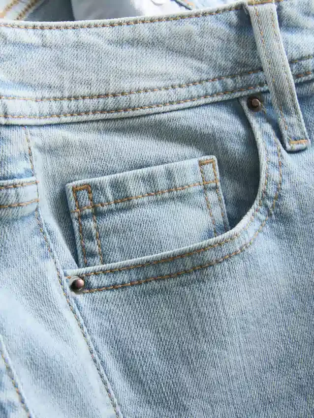 Flared-jeans i bomullsdenim med medelhög midja