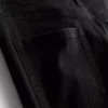 Flared-jeans i bomullsdenim med medelhög midja
