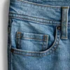 Flared-jeans i bomullsdenim med medelhög midja