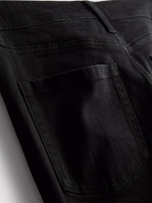 Flared-jeans i bomullsdenim med medelhög midja