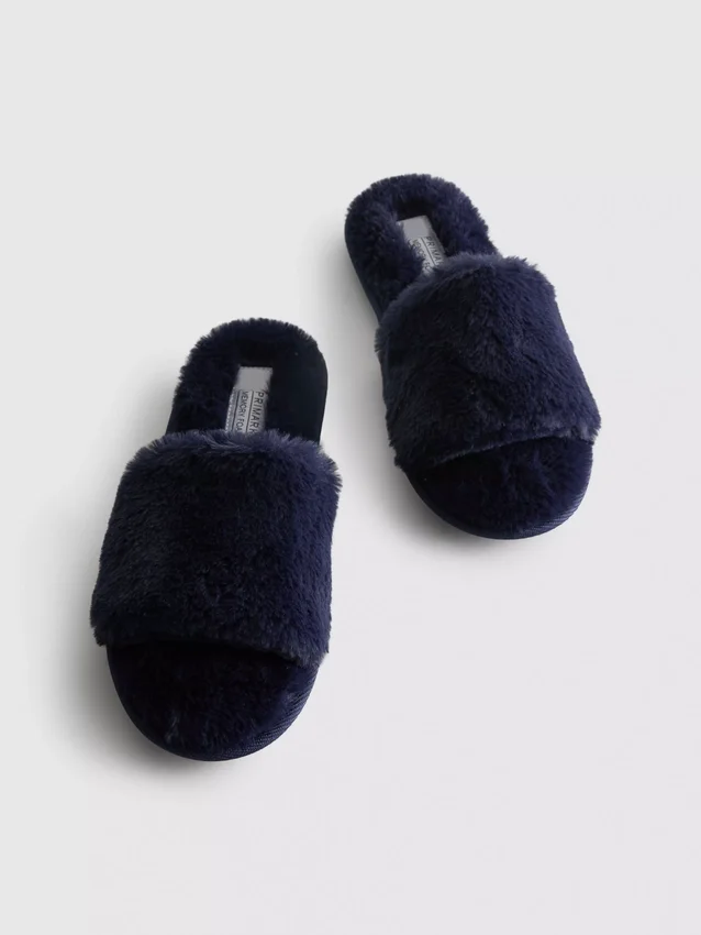 Fluffiga tofflor med korsband