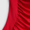 Formad baddräkt med draperade detaljer