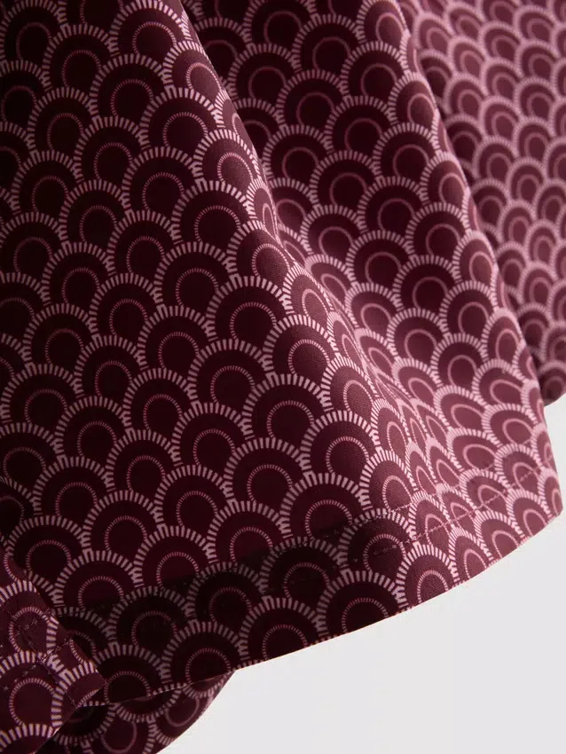 Geometriska badshorts med dragsko