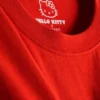 Hello Kitty-T-shirt i bomull med avslappnad passform och jordgubbsmotiv