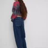 Högmidjade, avsmalnande jeans i bomullsdenim