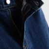 Högmidjade, avsmalnande jeans i bomullsdenim