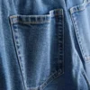 Högmidjade, avsmalnande jeans i bomullsdenim