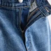 Högmidjade, avsmalnande jeans i bomullsdenim