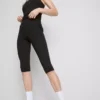 Högmidjade, släta och stödjande capri-leggings för träning