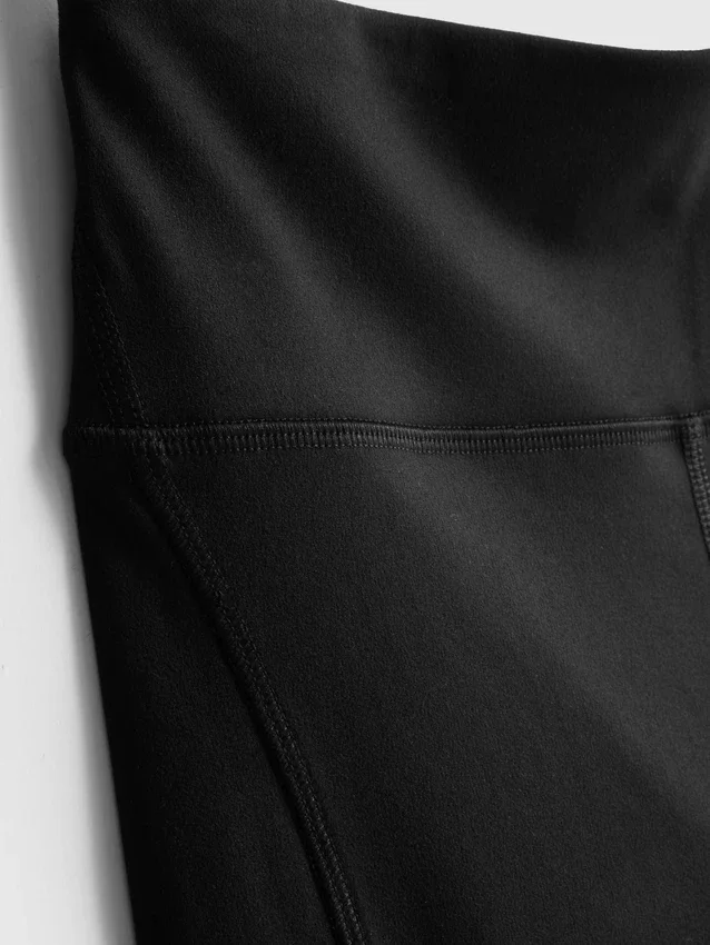 Högmidjade, släta och stödjande capri-leggings för träning
