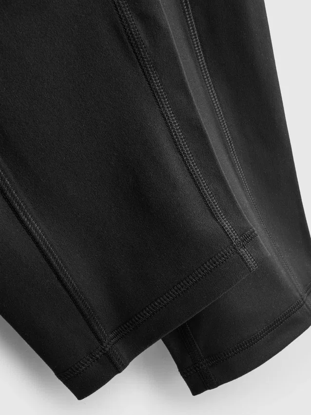 Högmidjade, släta och stödjande capri-leggings för träning