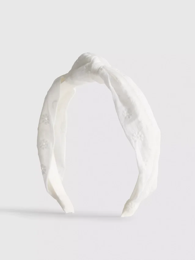 Hårband med broderie anglaise-knut