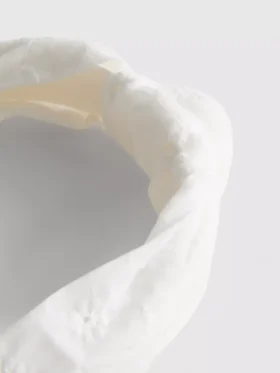 Hårband med broderie anglaise-knut