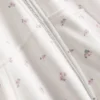 Huvtröja med dragkedja i bomullsrik blommig design